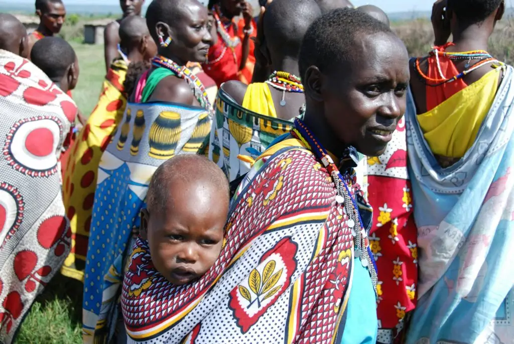 A colorful African family gathering showcasing traditional clothing and cultural essence.